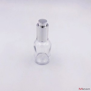 30 ml skaidraus stiklo butelis su mygtuko lašintuvu
