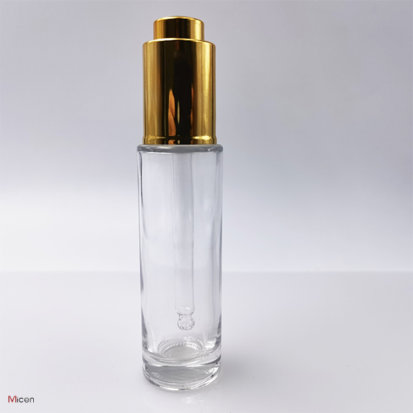 Clear glass bottle with push button dropper UV coating Featured Image